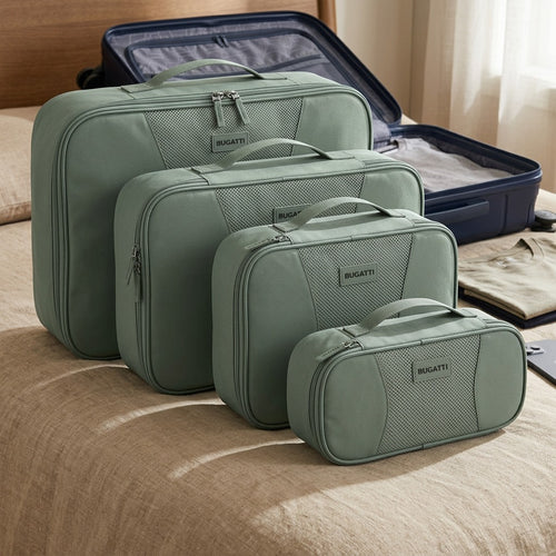 Four sage green Bugatti compression packing cubes in tiered sizes shown next to an open suitcase.